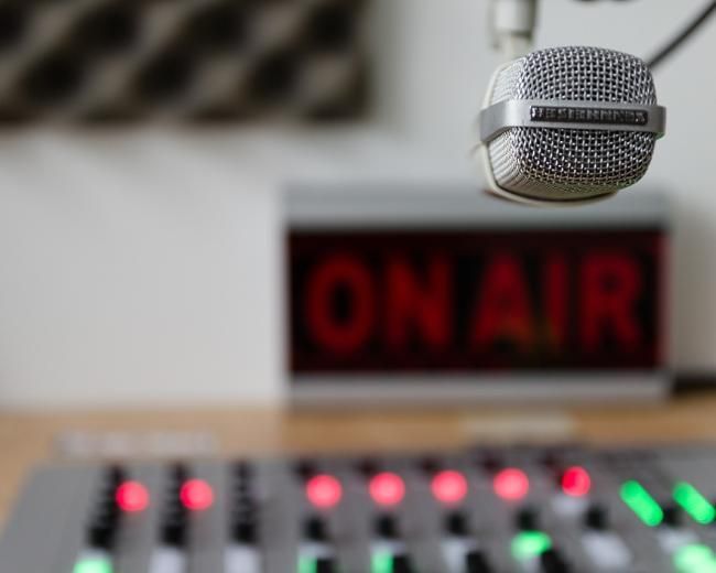 Sound board and microphone with an on-air sign