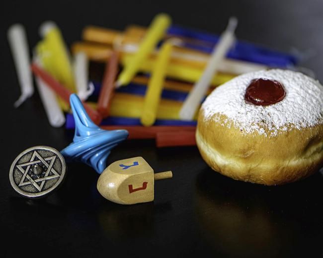 Candles, dreidels and a donut
