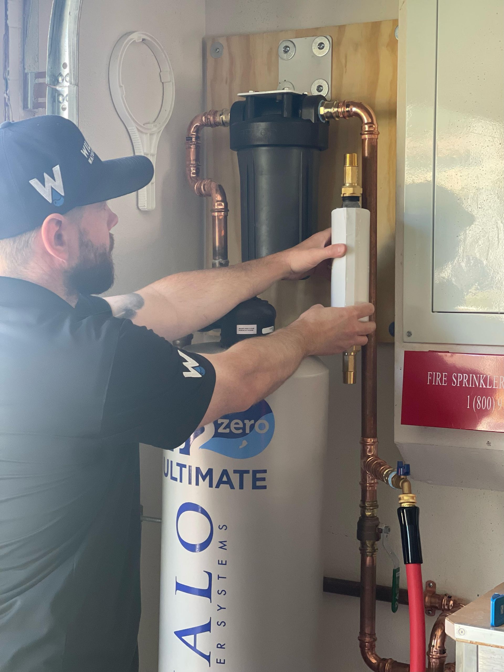 A close up of a water meter on a pipe.