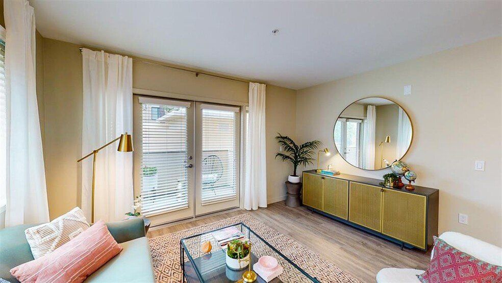 Living Room with Oversized Balcony Door at Chase Knolls Apartments
