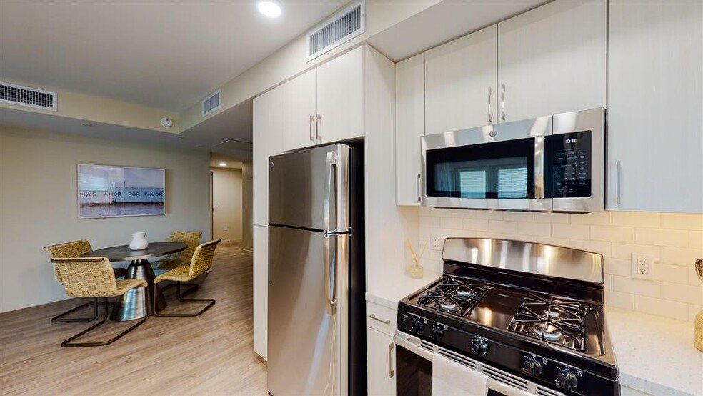 Kitchen with stainless steel appliances at Chase Knolls Apartments