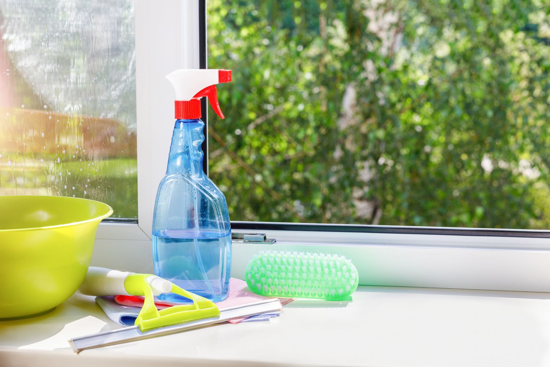 Cleaning equipment representing expert residential window cleaning for spotless glass. Cleaning equipment representing expert residential window cleaning for spotless glass.