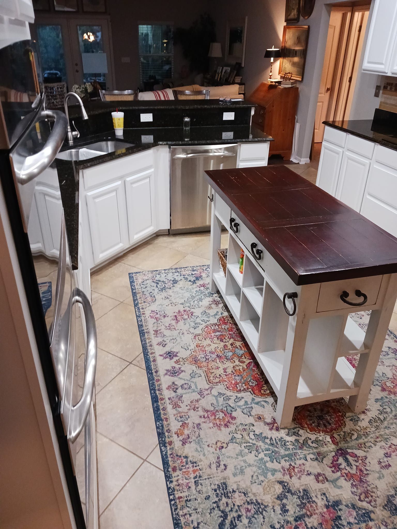 A kitchen with a large island in the middle of it.