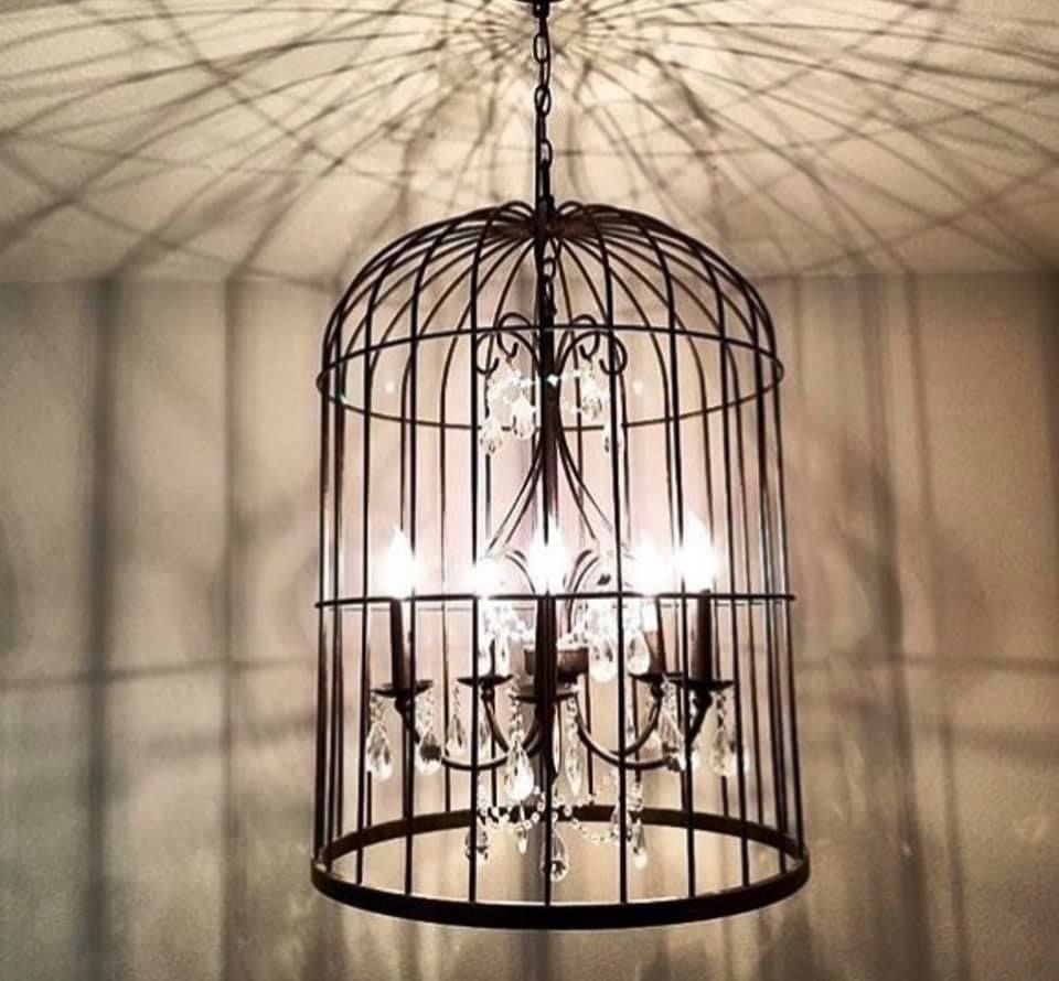 A chandelier in the shape of a bird cage