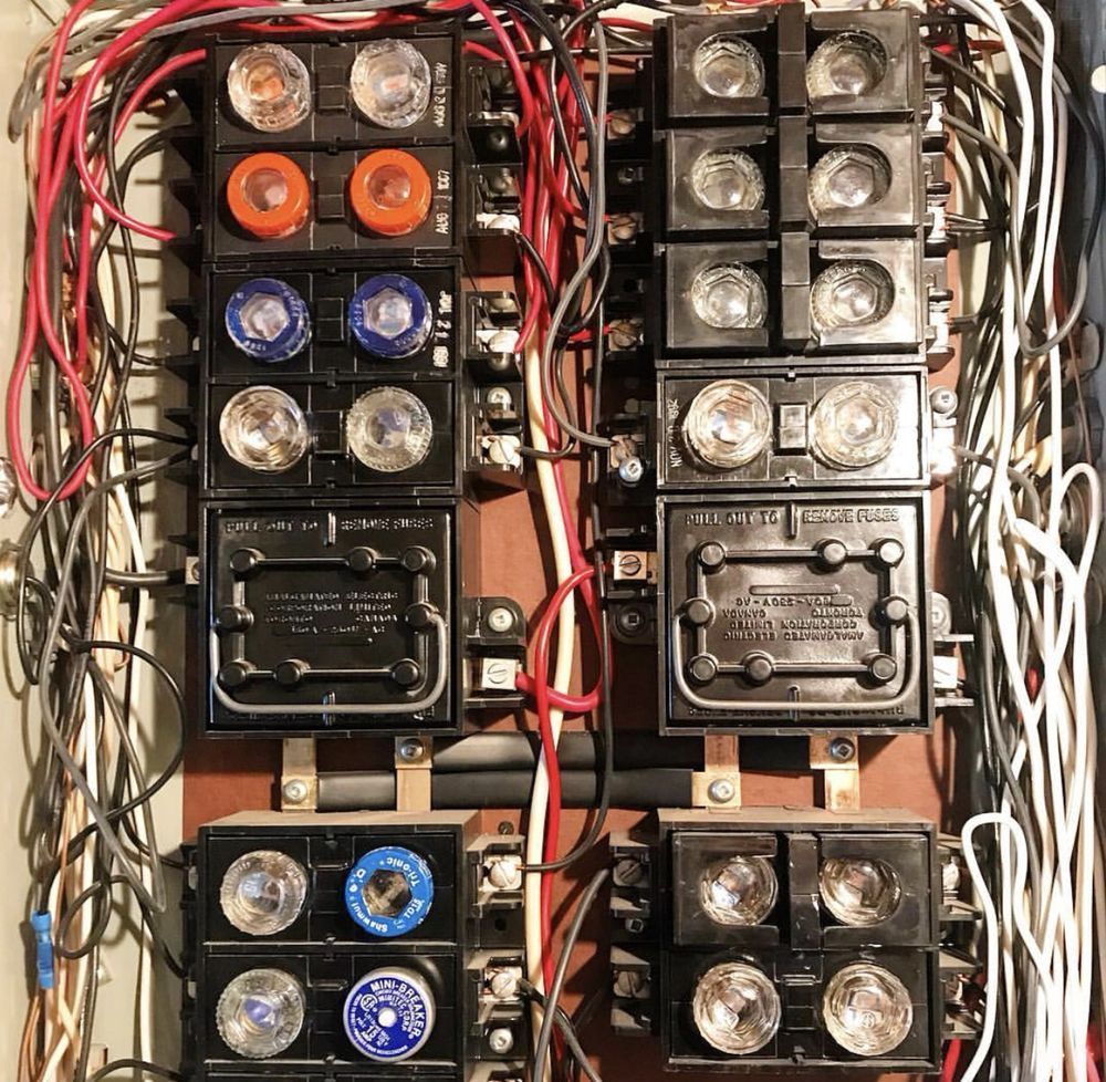 A bunch of wires are connected to a electrical box
