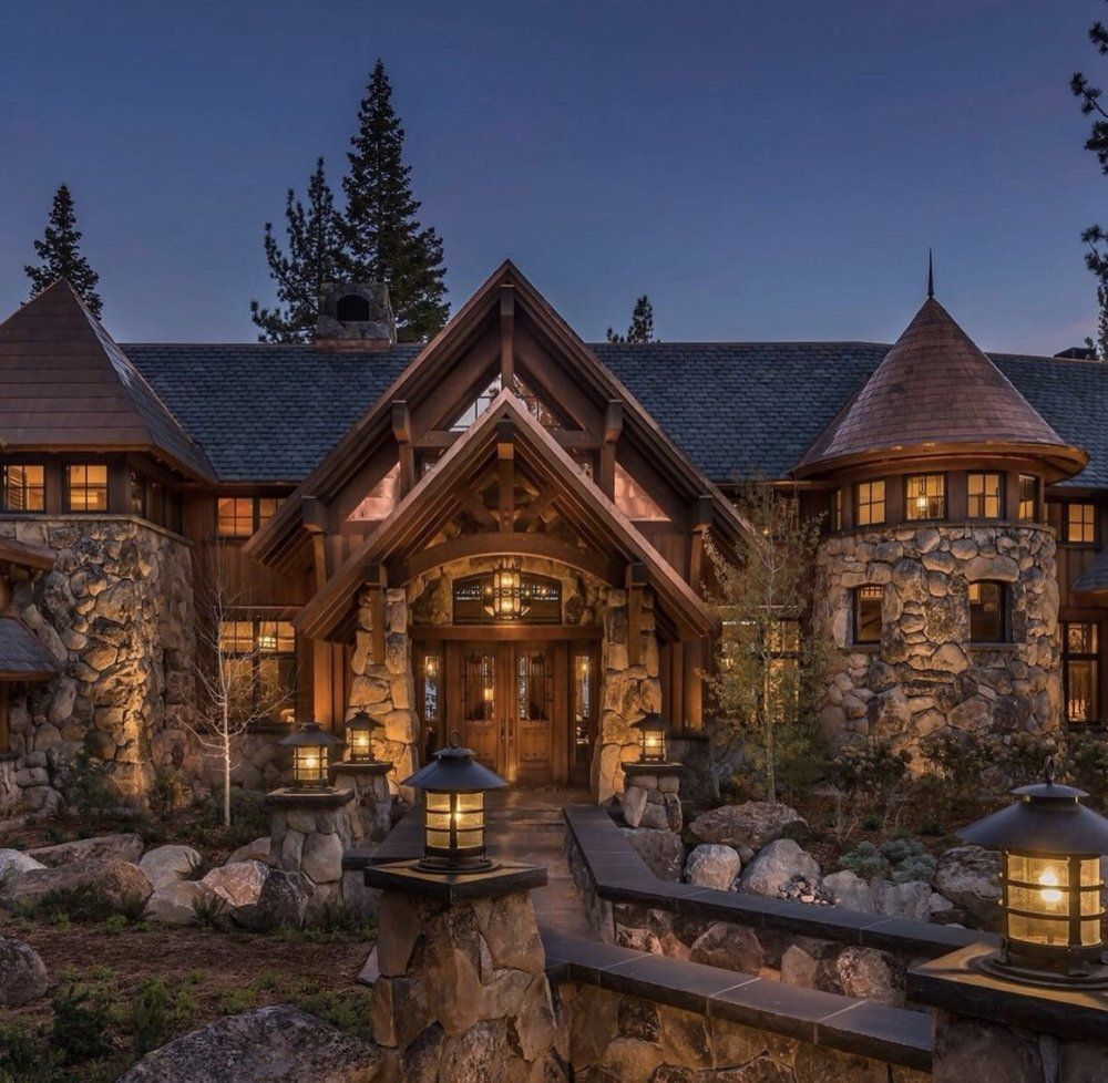 A large house with lanterns in front of it