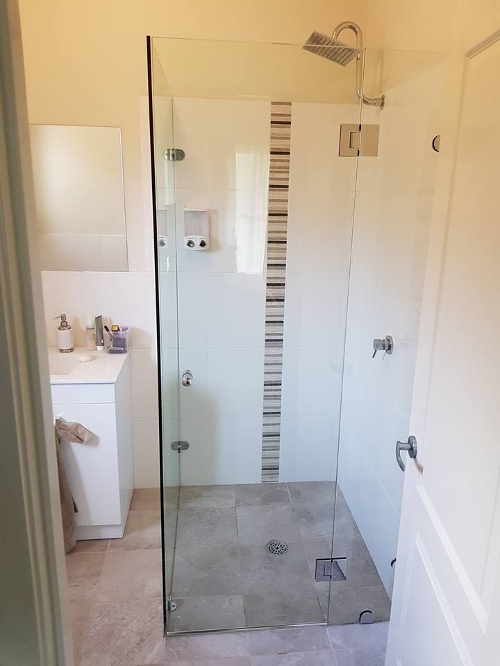A Bathroom With a Walk in Shower and a Sink — Moss Vale Glass In Moss Vale, NSW
