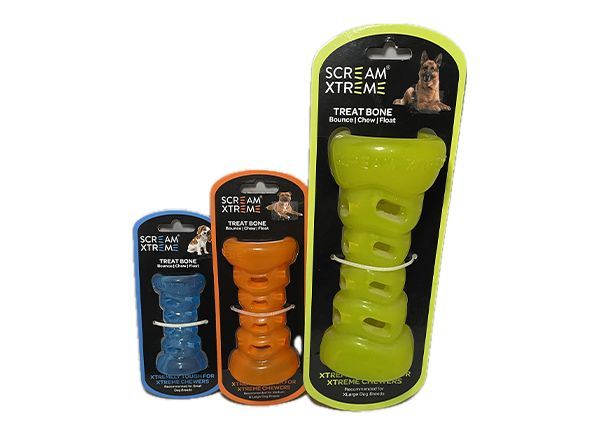 Three dog treat toys in blue, orange, and green packaging. Each toy is bone-shaped with holes and a dog graphic.