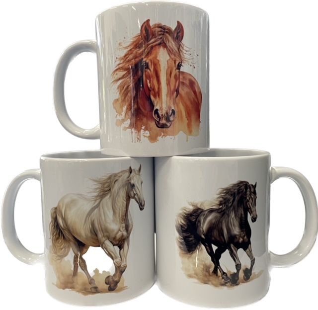three coffee mugs with horses on them are stacked on top of each other .