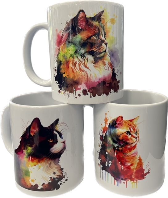 three mugs with cats on them are stacked on top of each other