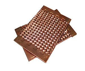 Two pieces of copper are stacked on top of each other