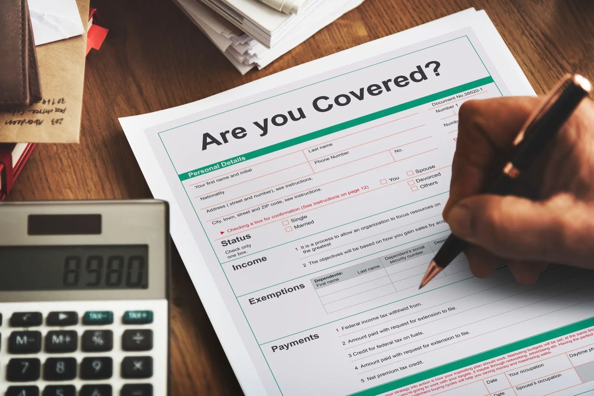 a person is filling out a form that says are you covered