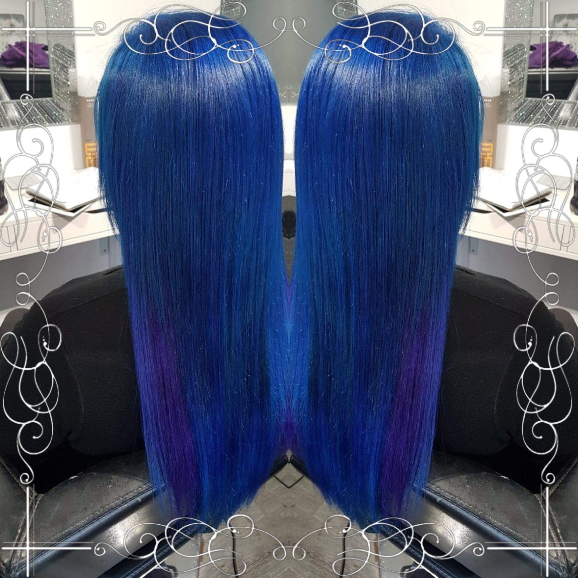 A woman with long blue hair is sitting in a chair.