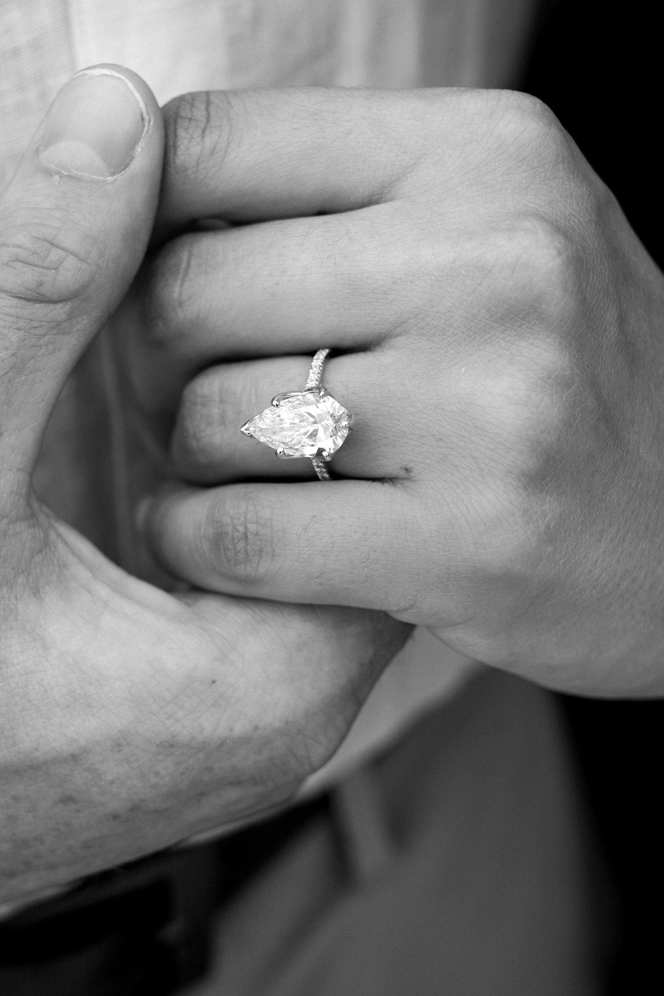 A close up photograph of a diamond engagement ring