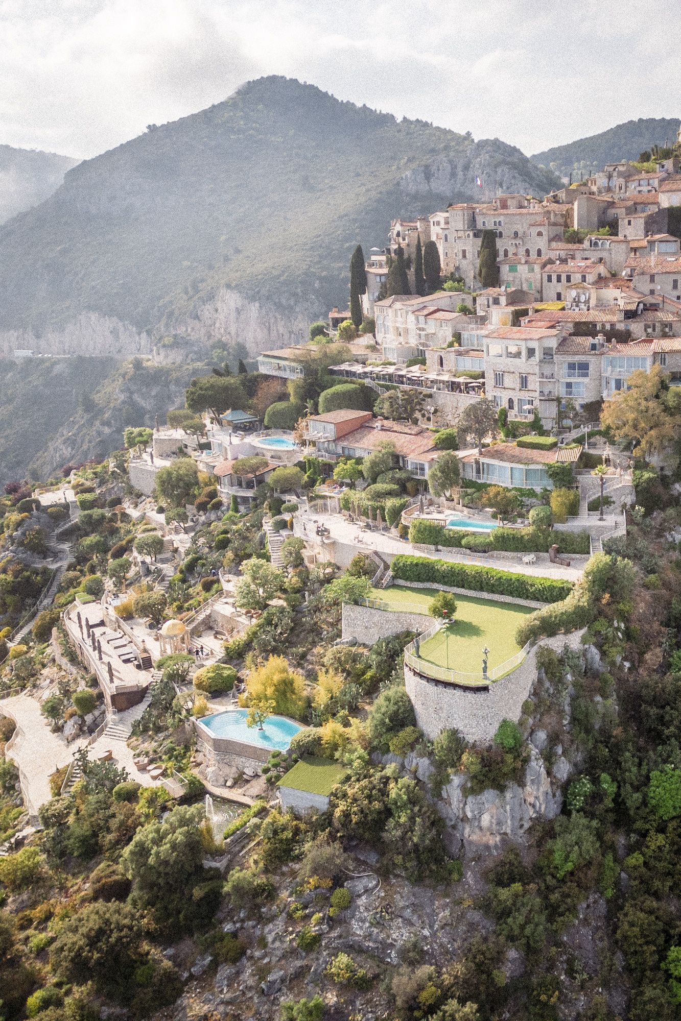 Aerial photo of Eze village south side with terraces of Chevre d'Or Hotel.