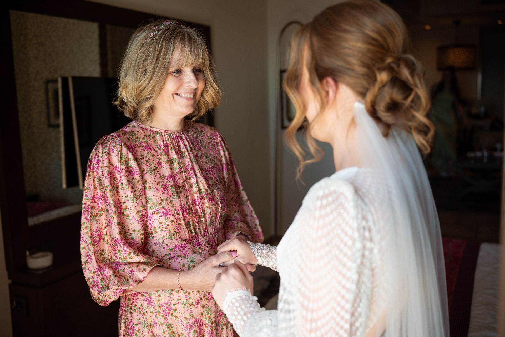 A bride with her mother before a wedding ceremony at the Tiara Miramar Beach Resort.