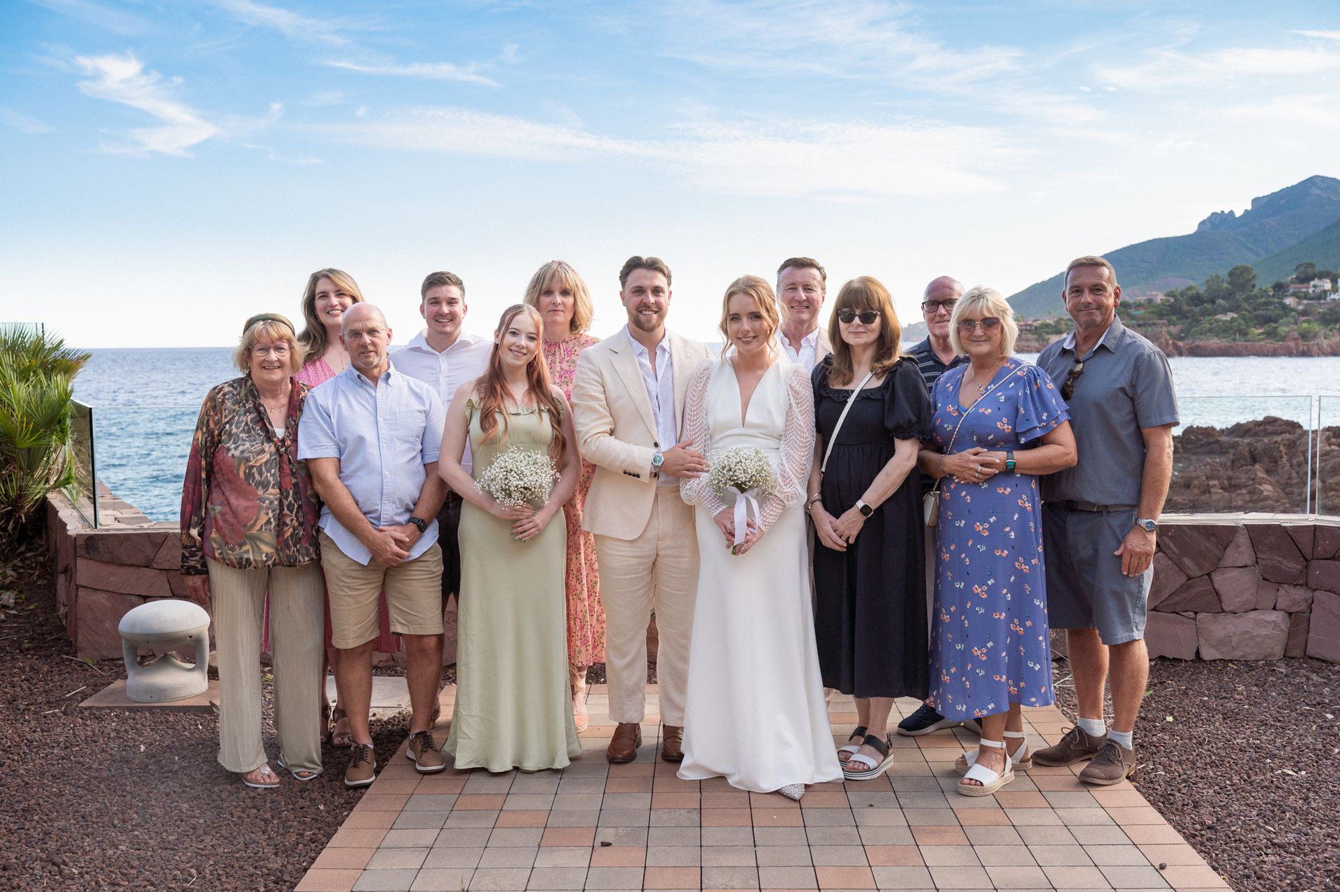 A wedding group portrait taken at the The Tiara Miramar Beach Resort.