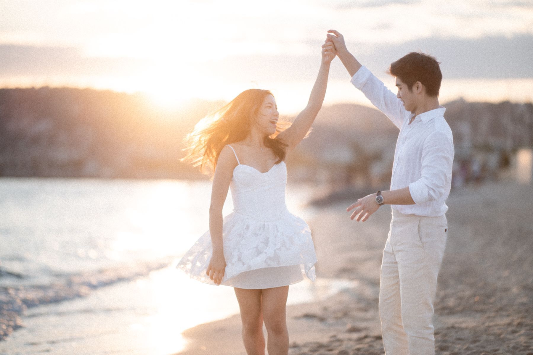 Sunset engagement photography on the beach in Cannes, French Riviera.