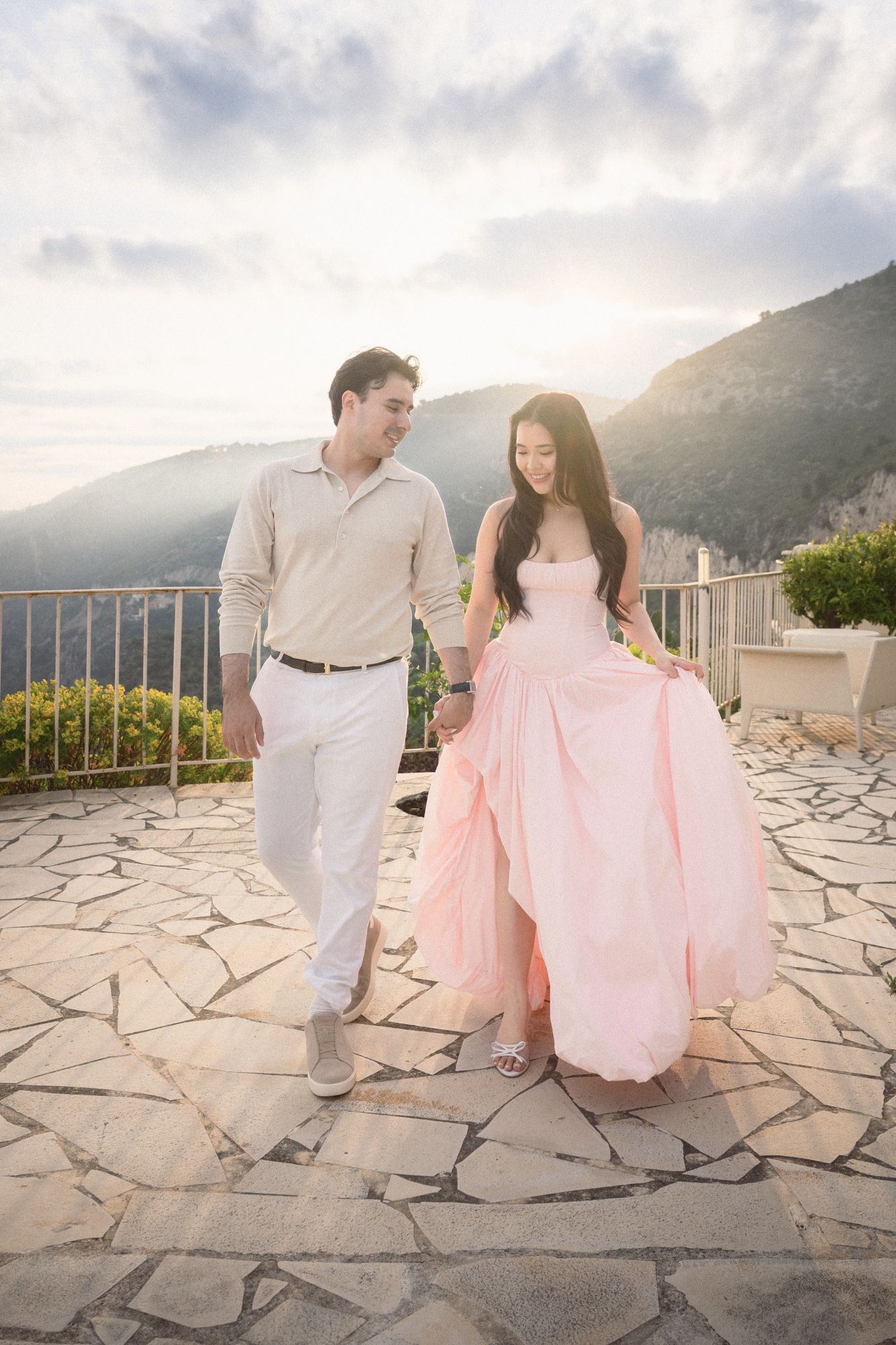 A romantic, natural image of a couple during an engagement photography session in Eze village, South of France.