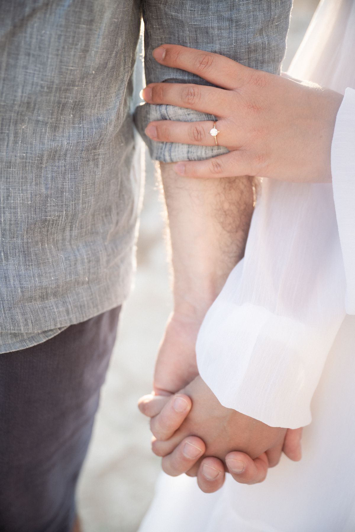 An engagement ring. image taken as part of a couple photoshoot.