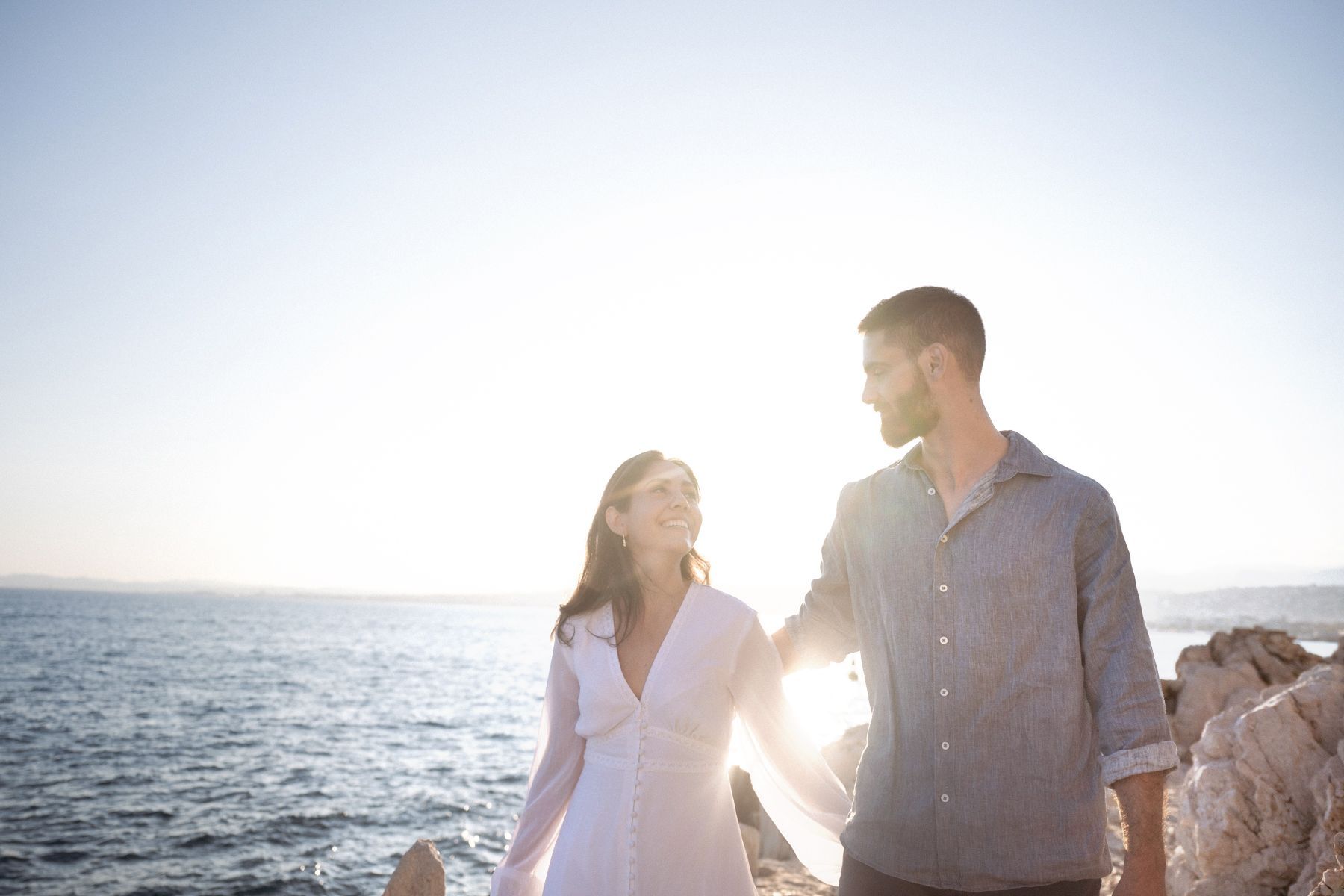 A natural, camera film, retro-style image during a golden hour couple photography session