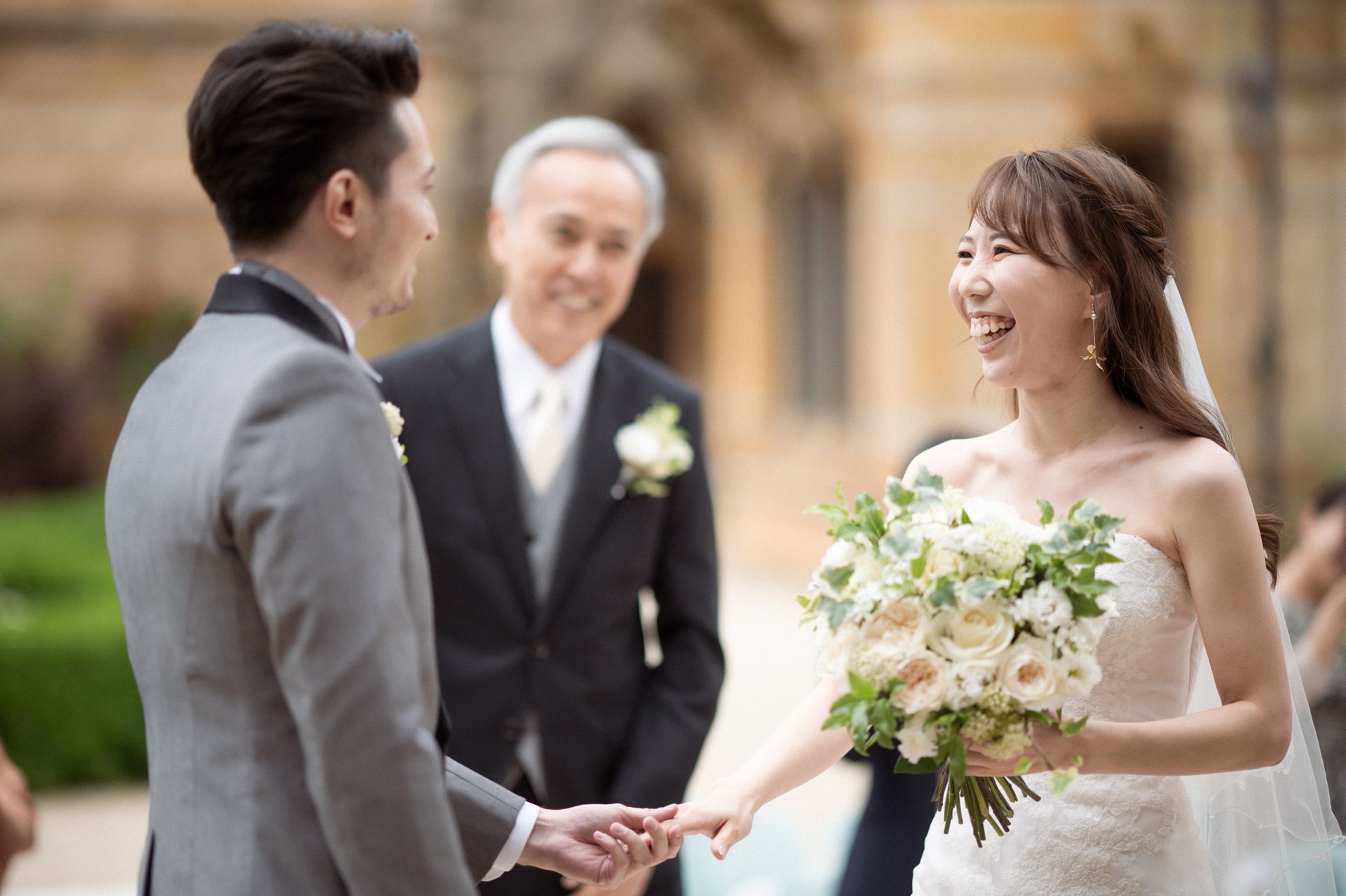 Bride's father giving his daughter away at her wedding.