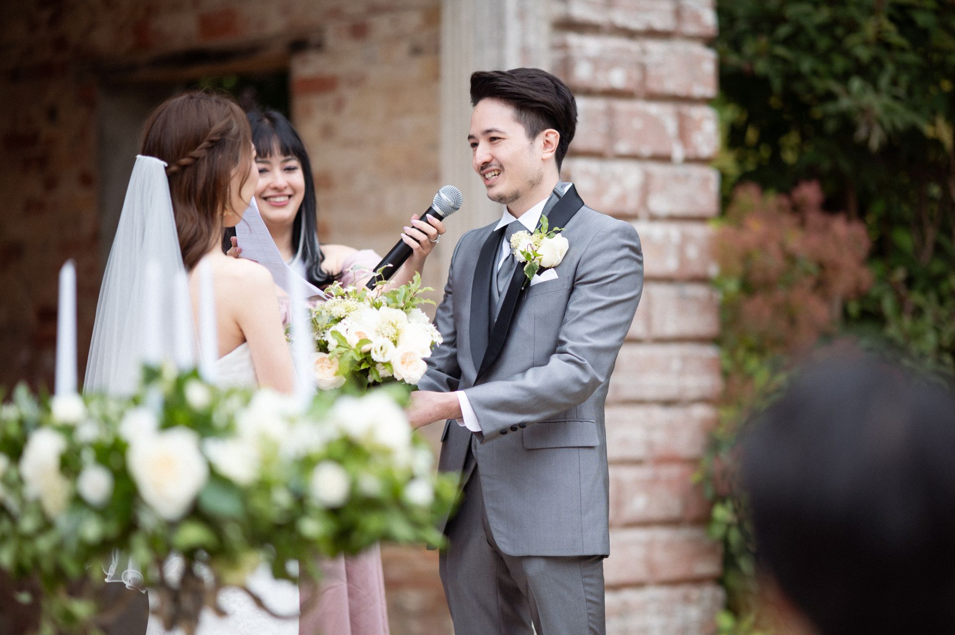 The vows are spoken at a wedding ceremony.