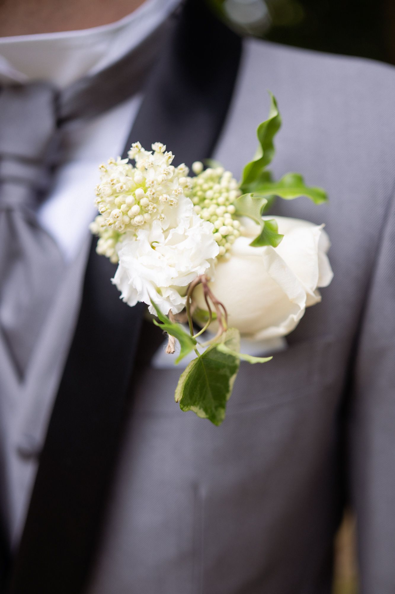 Details of the groom's suit