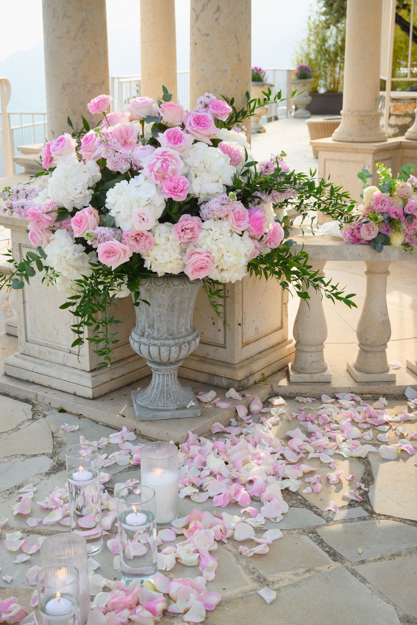 A floral display at the chevre d'Or Hotel before a golden hour proposal at the Temple of Love.