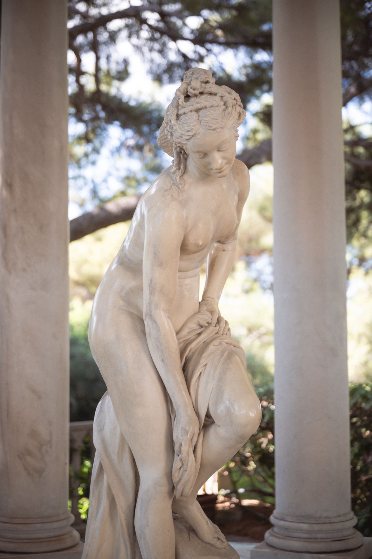 A close up of a statue in the gardens of Villa Ephrussi.