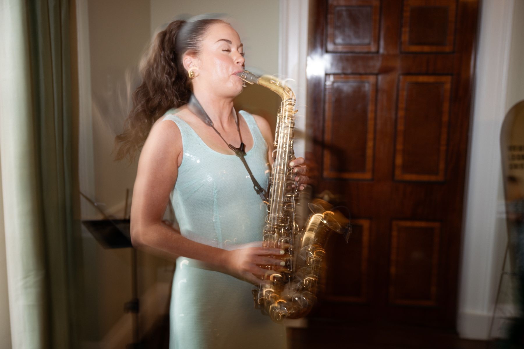 A saxophone player at Kelmarsh Hall.