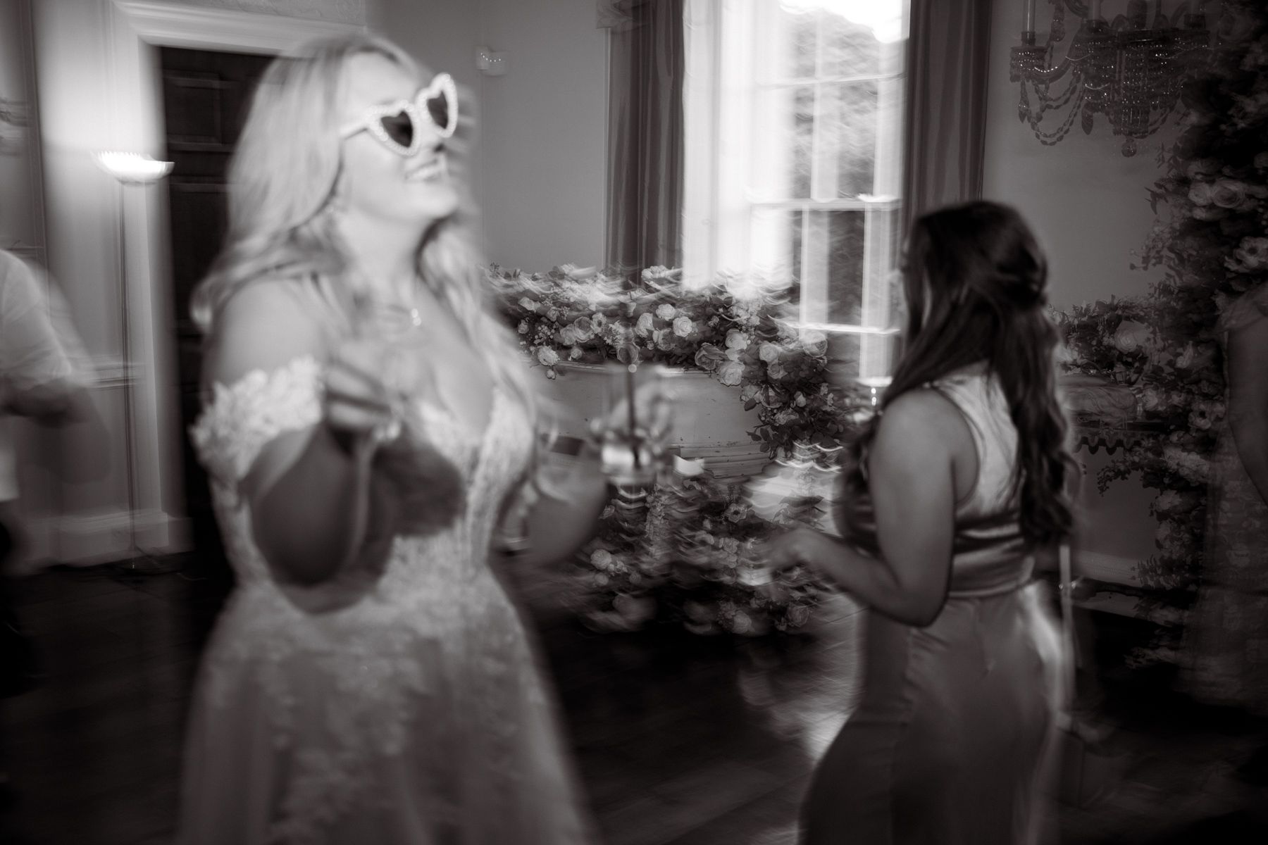 Night time wedding photography during a disco at Kelmarsh Hall.