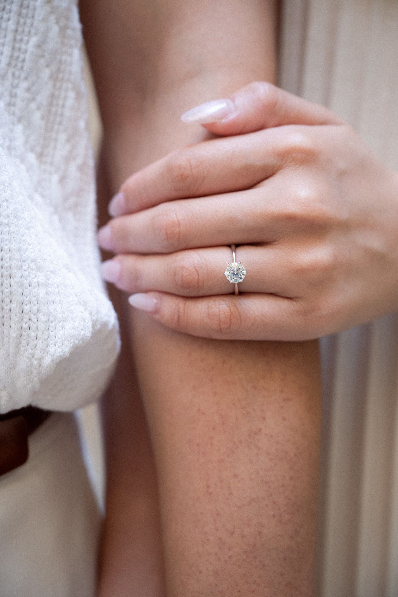 A close up of an engagement ring during a photoshoot on the French Riviera.
