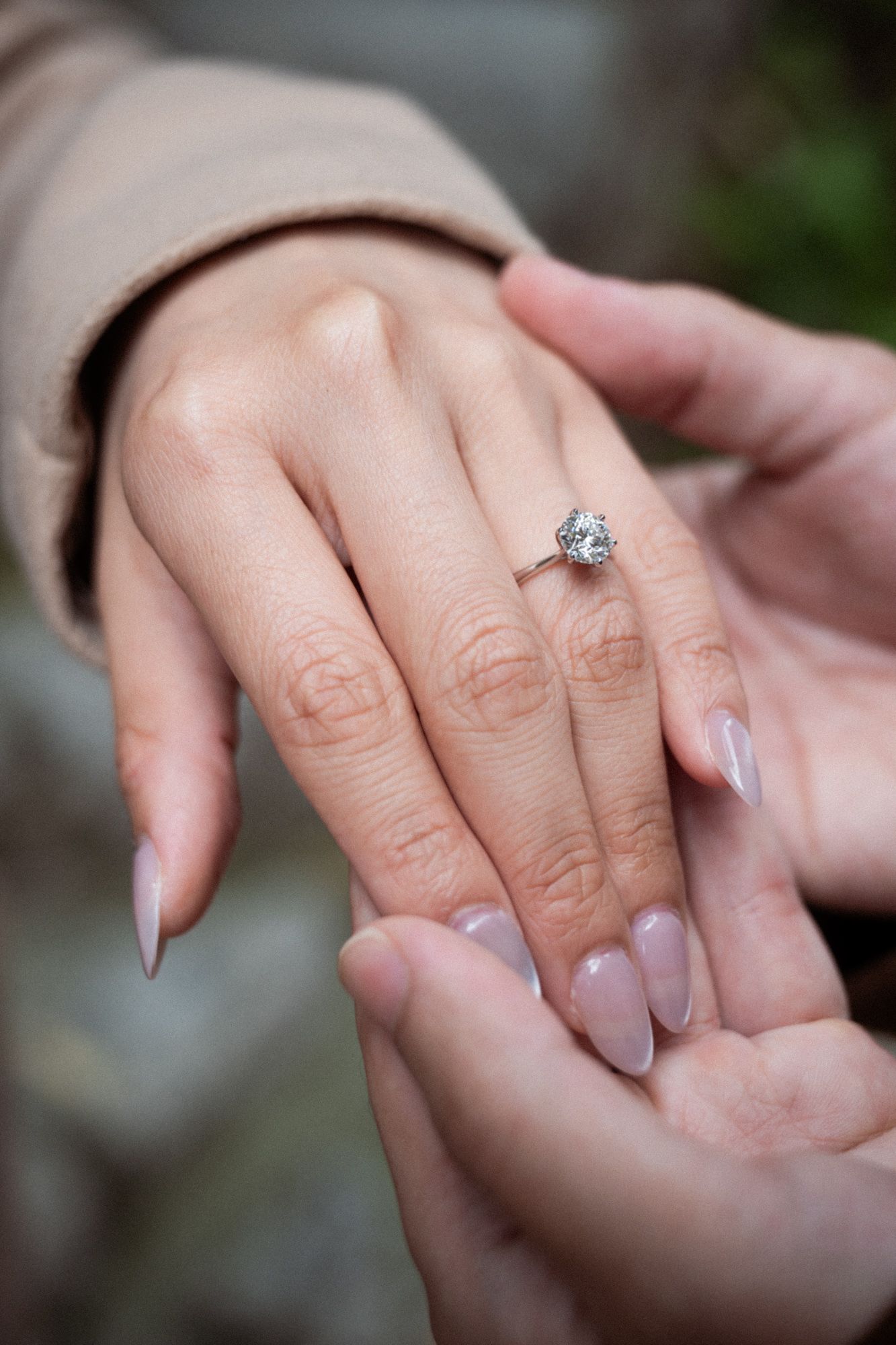 A close up photograph of an engagement ring taken during a romantic photoshoot in Eze, France.