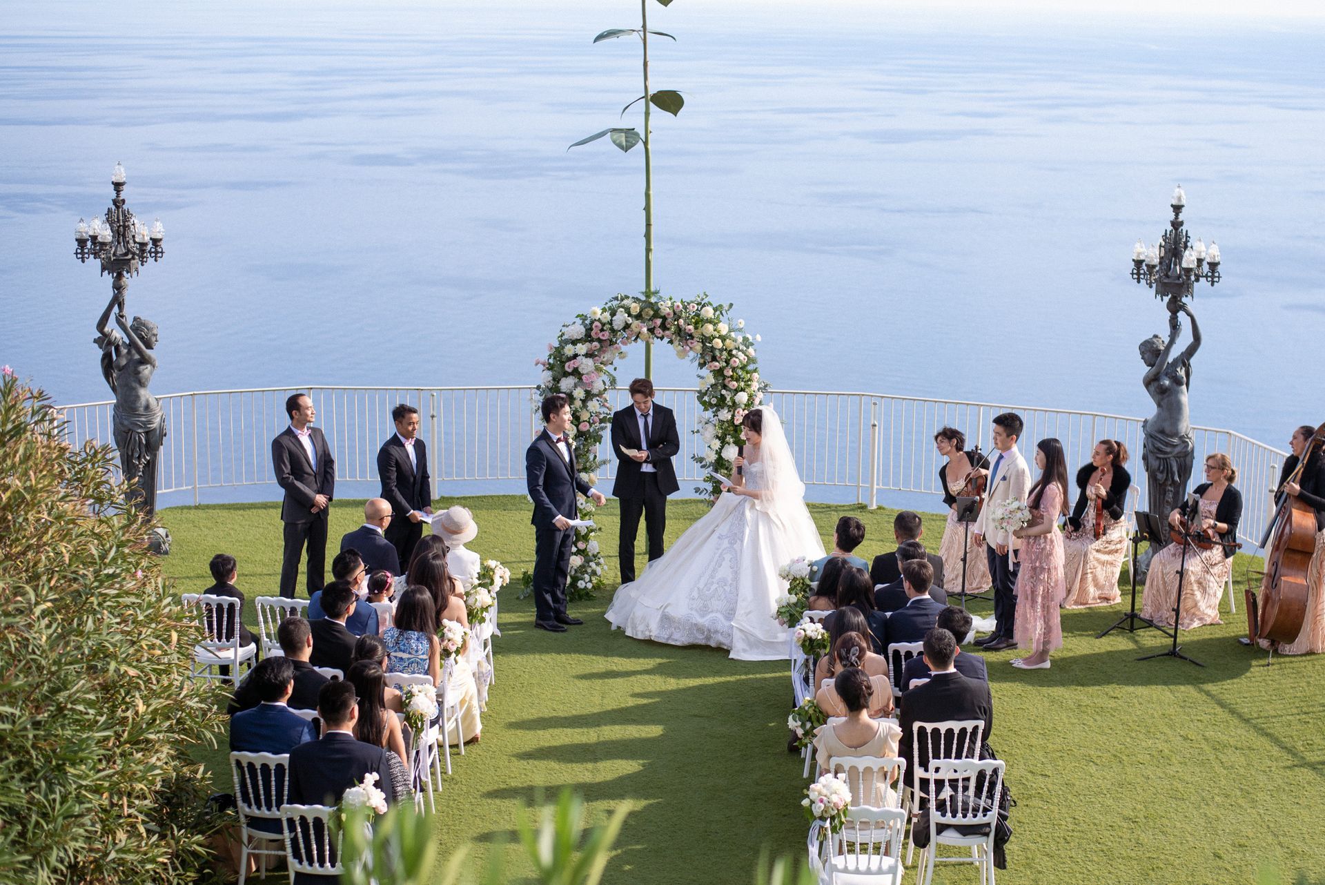 A wide shot of a wedding ceremony at the Chevre d'Or Hotel
