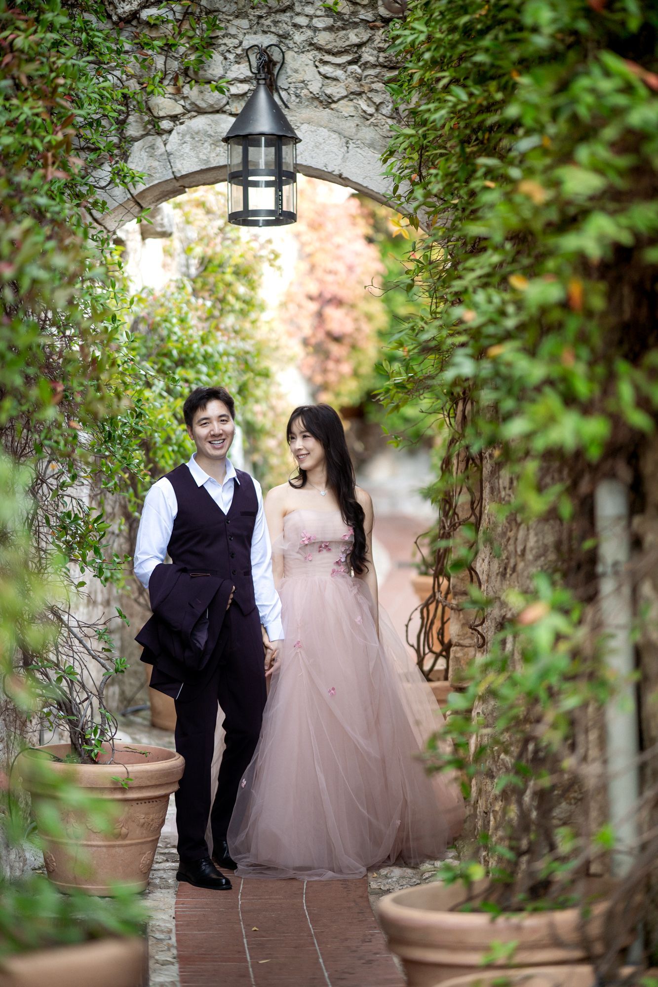 A couple portrait taken under the arch in Eze village.