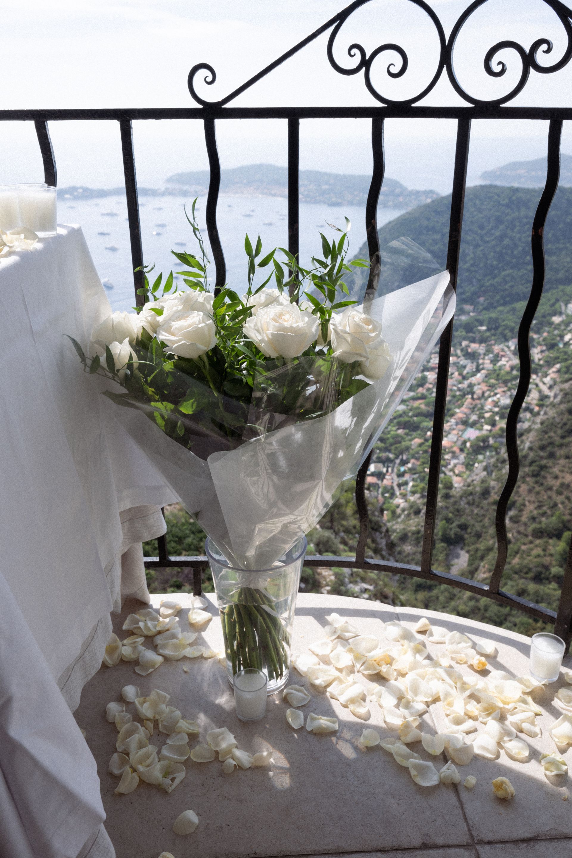 A bouquet of flowers on the balcony of Chateau Eza during a proposal in Eze village.