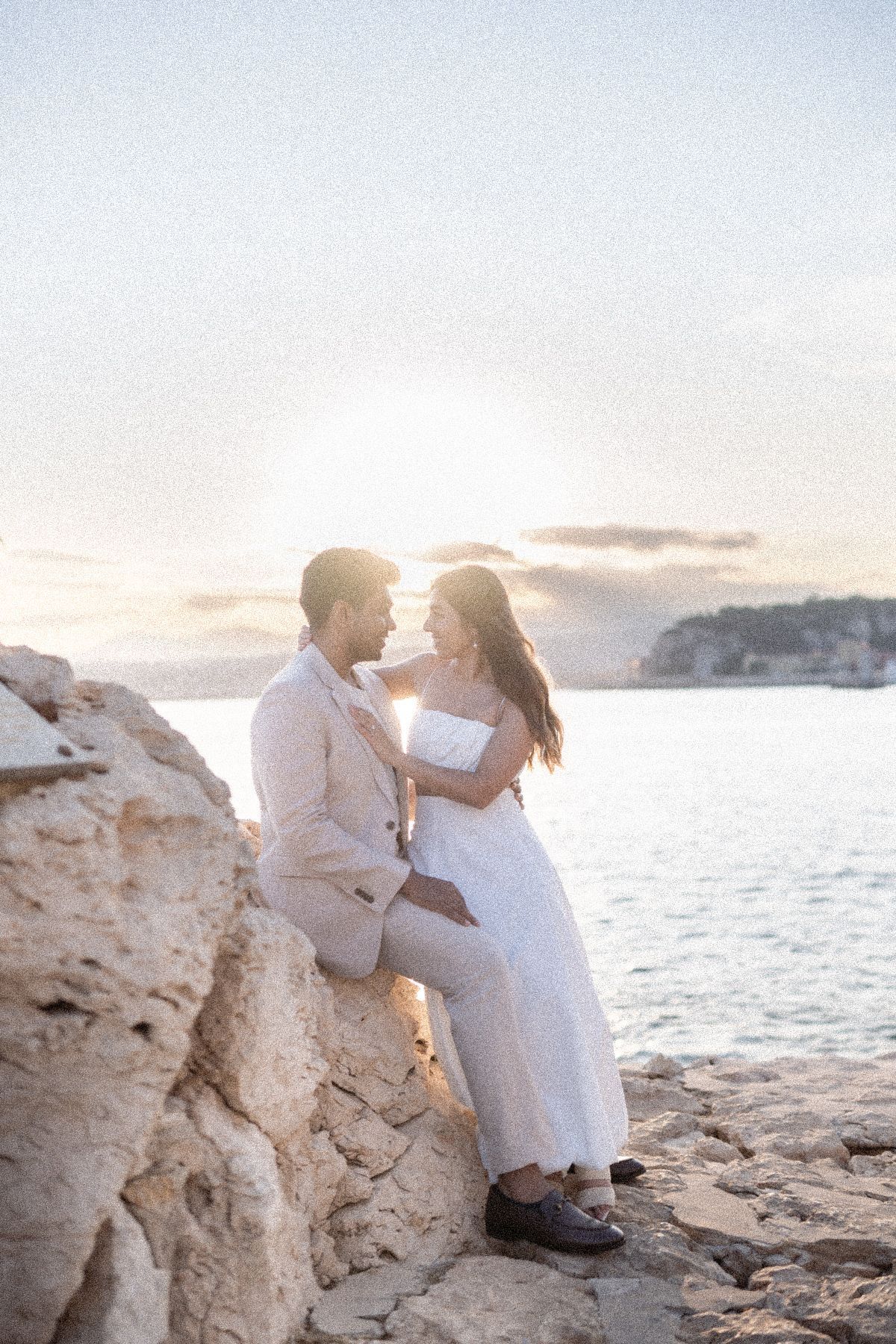 a couple photographed on Coco Beach coastal walk in Nice during a couple photo session.
