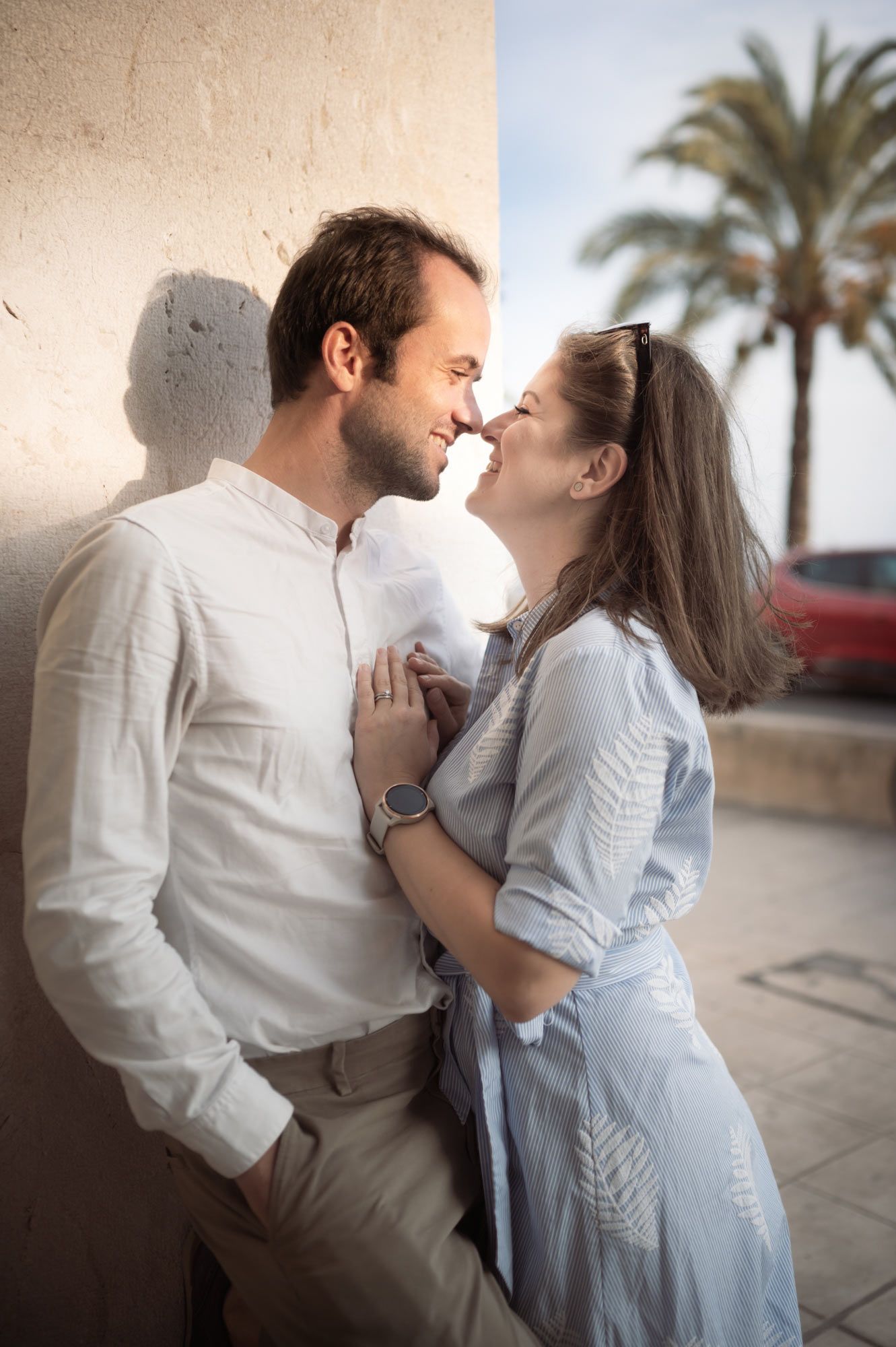 A couple embrace in Nice's old town during a couple photography session