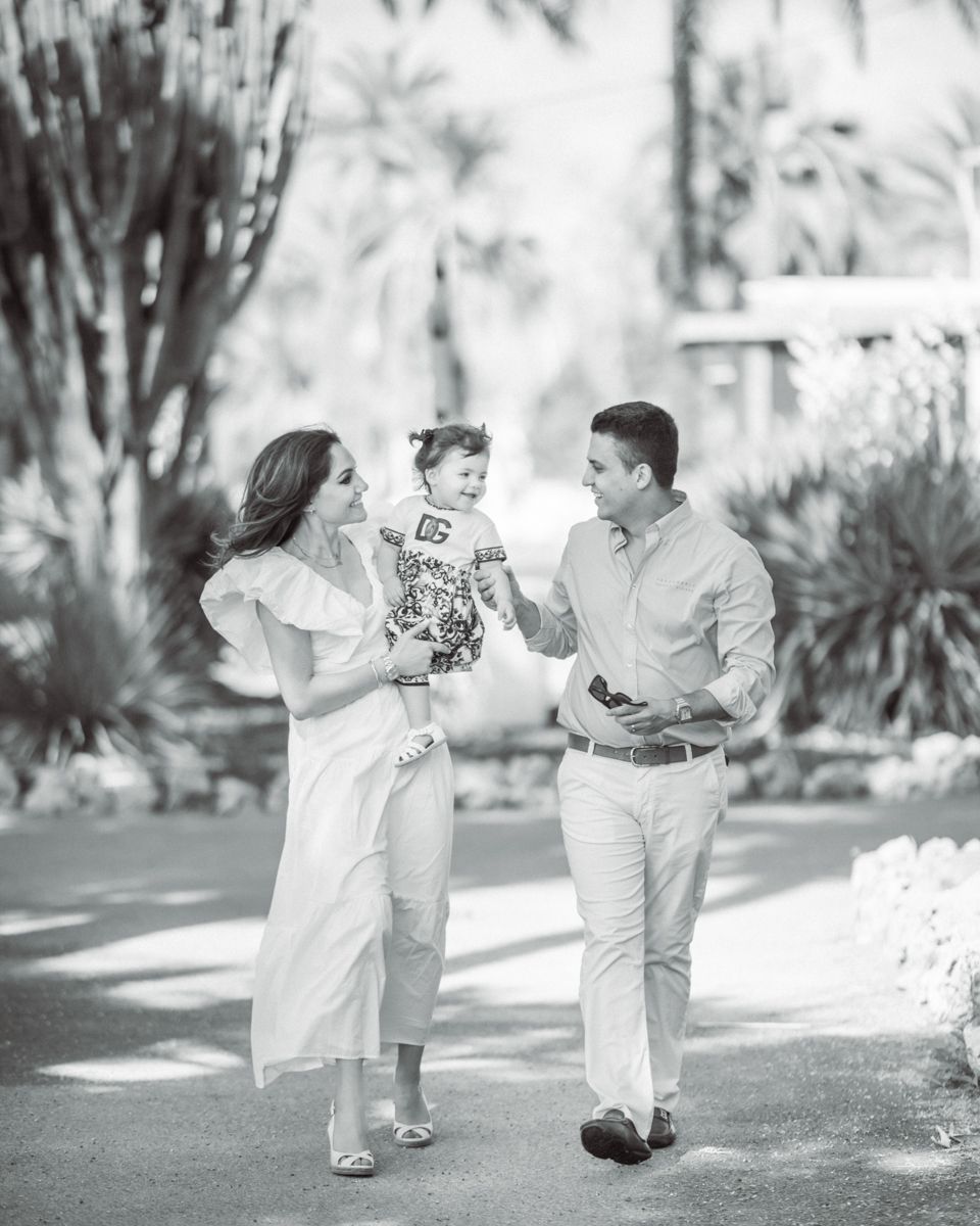 family walking through park
