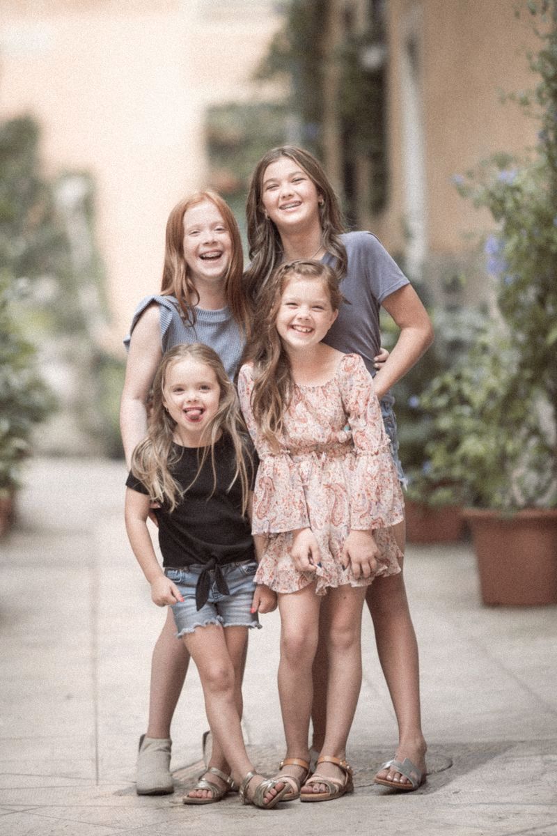 a family photoshoot of sisters in Nice old town by family photographer Peter Horton