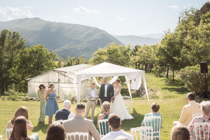 An outdoor wedding ceremony at Domaine de Glandeve, Entrevaux