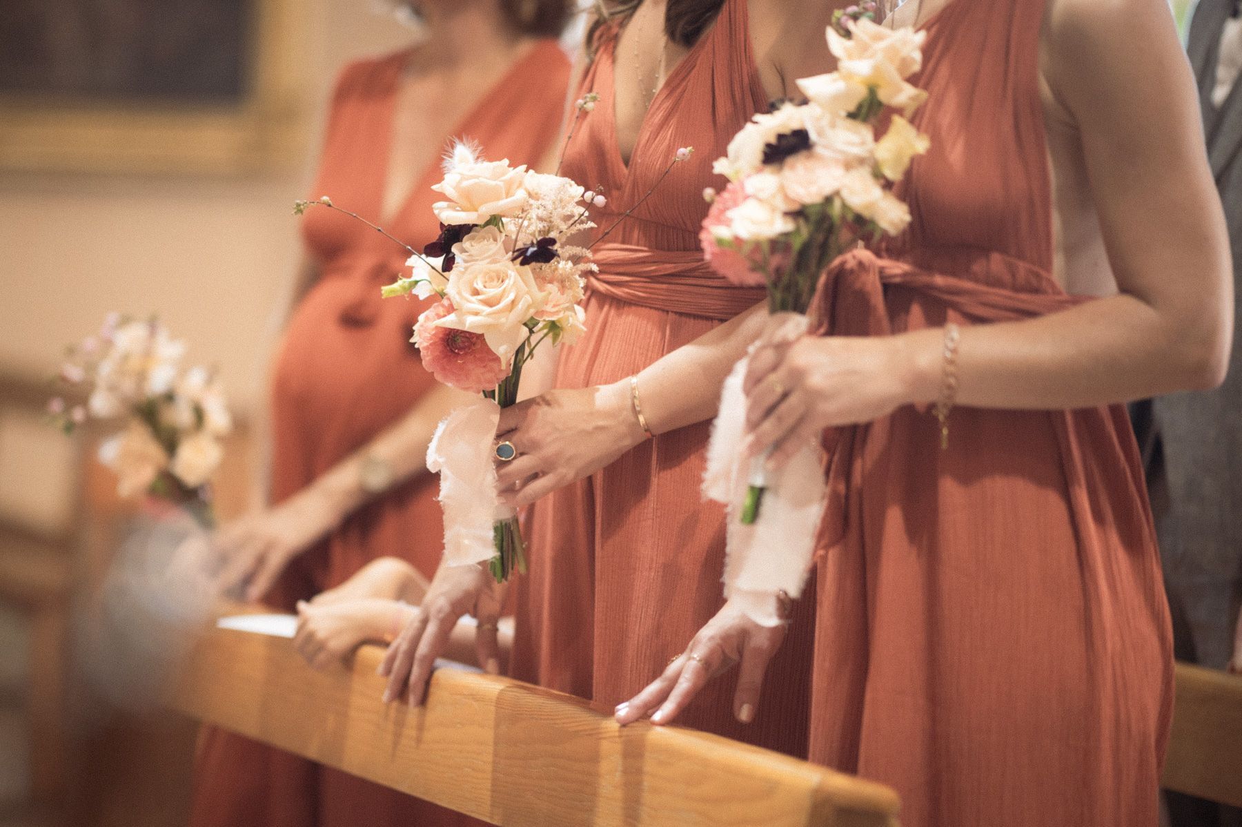 bridesmaids flowers and red dresses