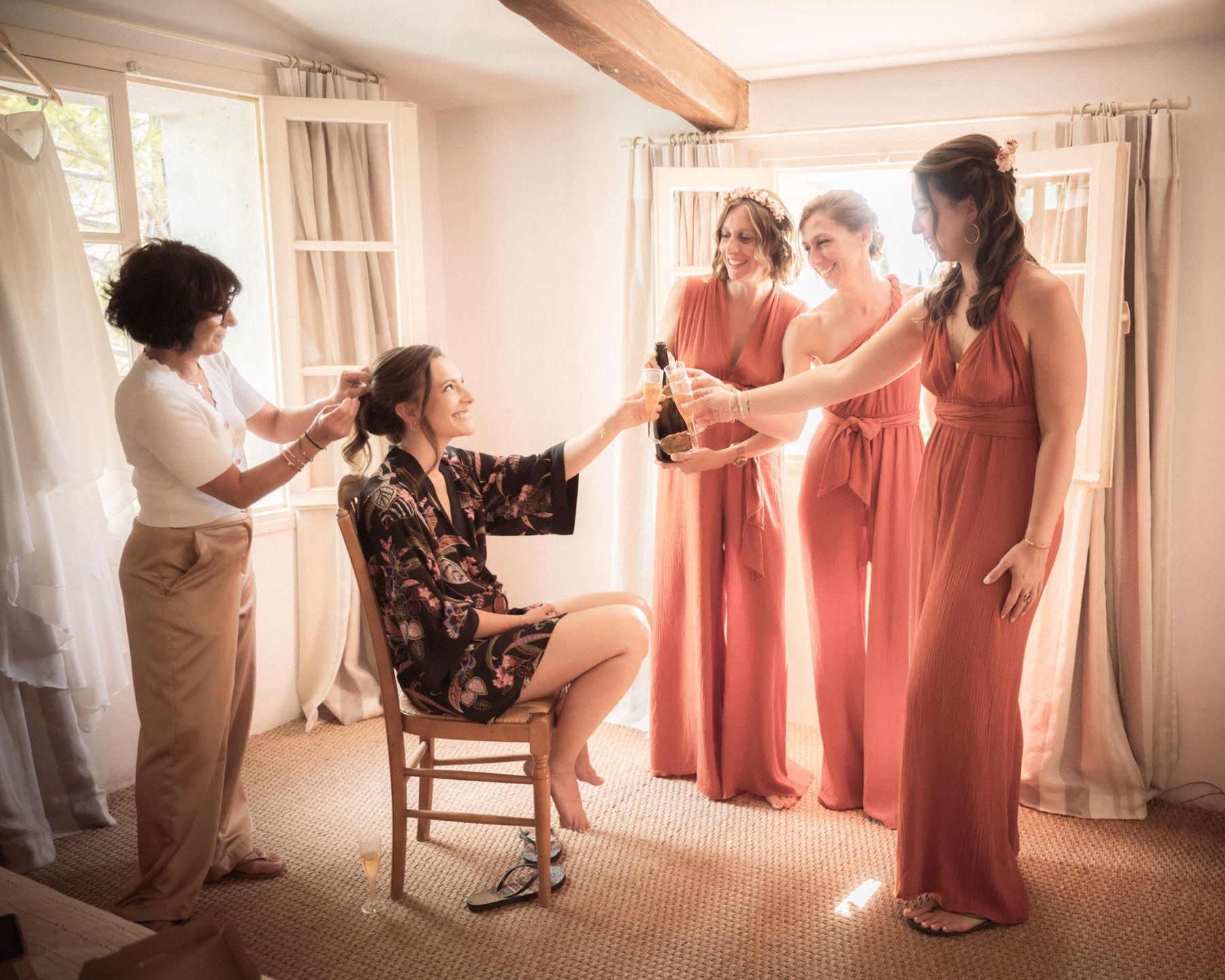 bride chinking champaign glasses