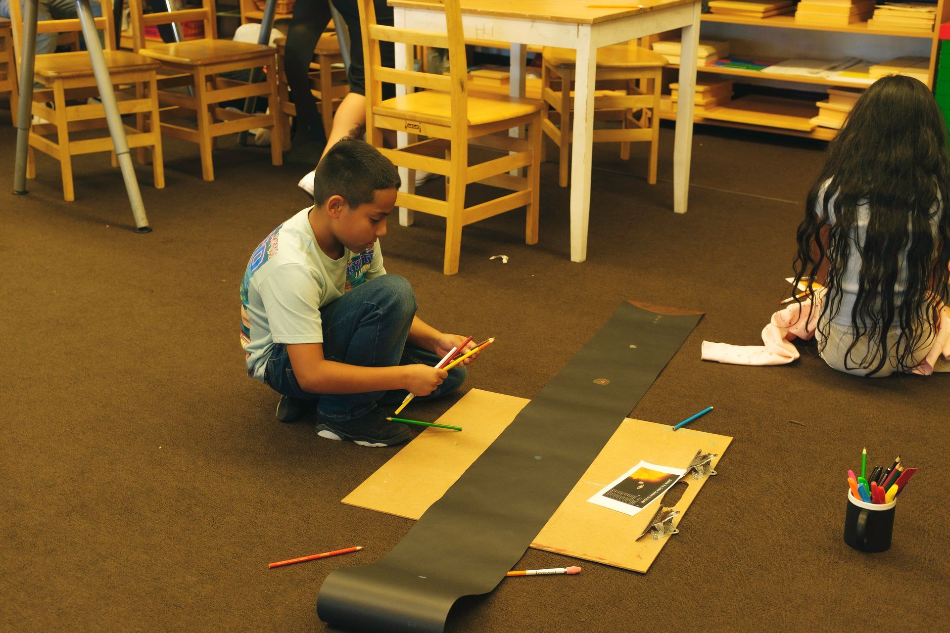 Montessori child working in the classroom