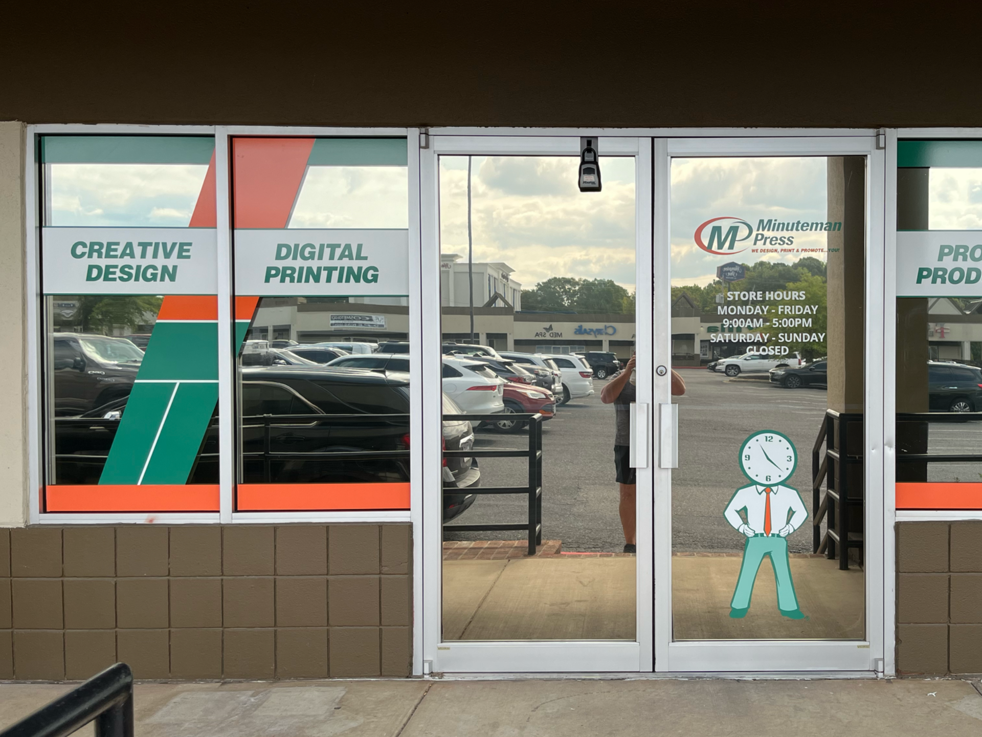 Storefront of a printing business | custom window graphics