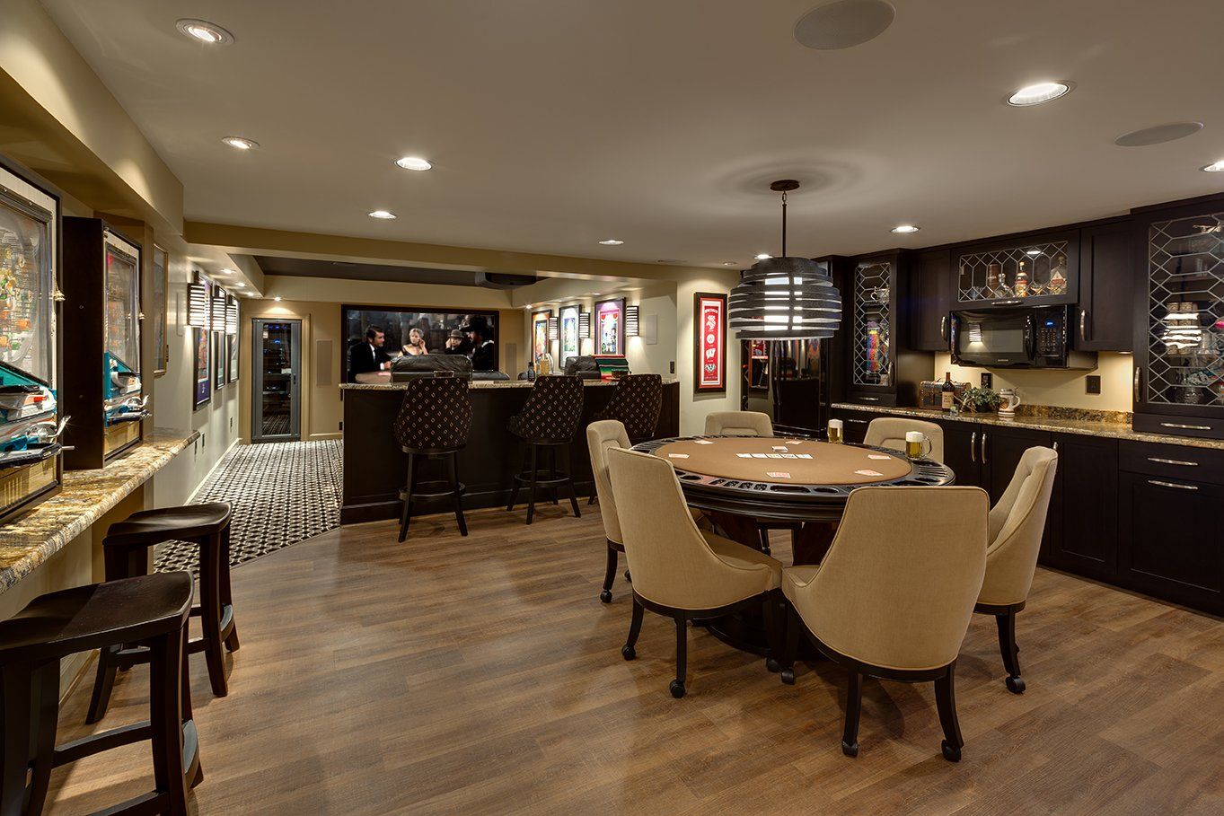 There is a poker table in the middle of the room.