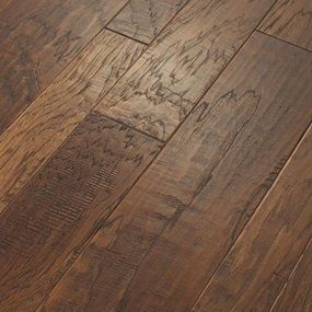 A close up of a wooden floor with a lot of grain.