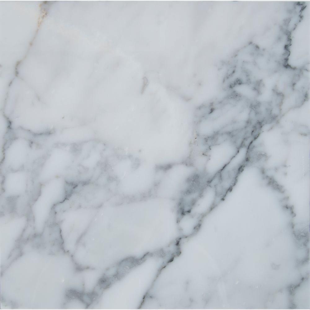 A close up of a white marble tile with a gray border.