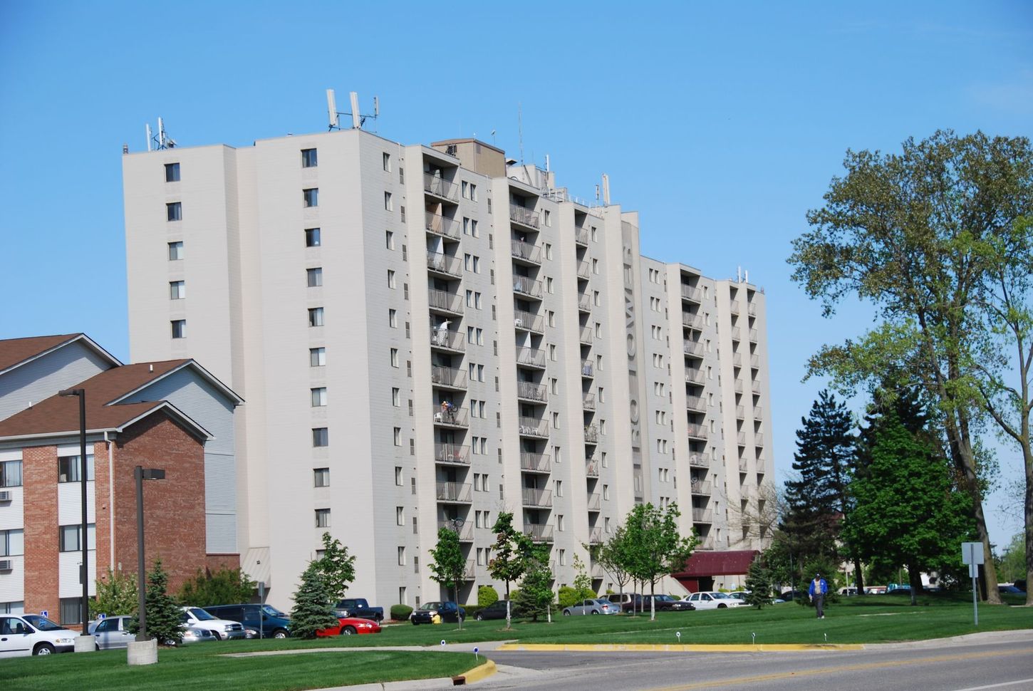 A tall building with antennas on top of it